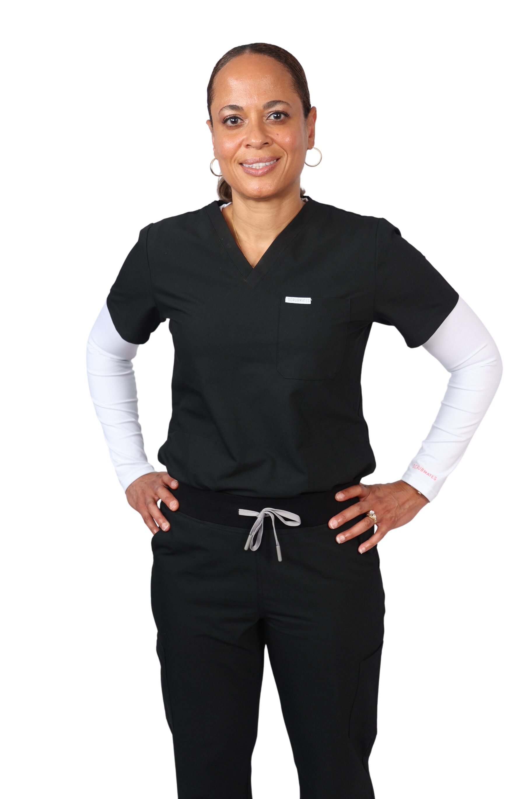 Elevate your work collection with the Scrubmates classic black scrub top for women made to pair perfectly with our classic straight leg pants.  Our exclusive design is trend-forward while still delivering timeless and professional style. Made from a superior quality polyester/rayon/spandex fabric mix, this top offers unparalleled all-day comfort. Our thoughtful and innovative design offers a chest pocket and 2 kangaroo pockets best scrubs for women figs scrubs