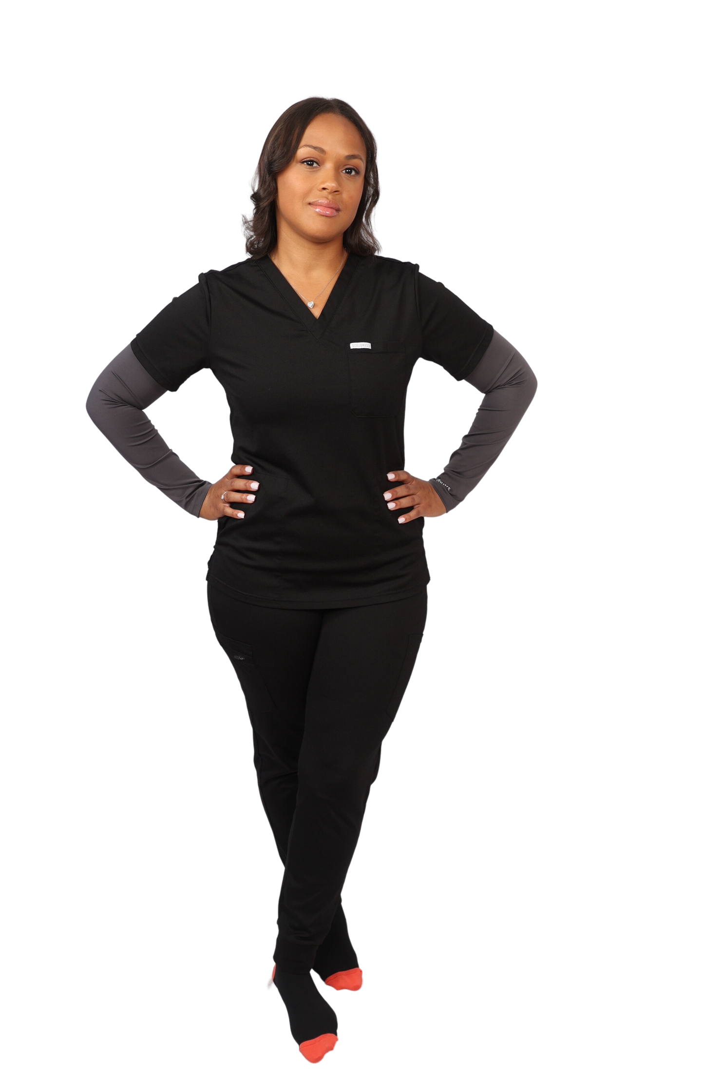 medical work uniform Scrubmates modern fit jogger black scrub pants for women made to pair perfectly with our modern fit jogger pants. Our exclusive design is on trend, professional and stylish. Made from a superior quality nylon/rayon/spandex fabric mix, this set offers unparalleled all-day comfort. Our luxe fabric blend offers the ultimate amount of stretch, and is designed to be flattering at every angle innovative design offers a chest pocket and 2 kangaroo pockets best scrub set for women figs scrubs