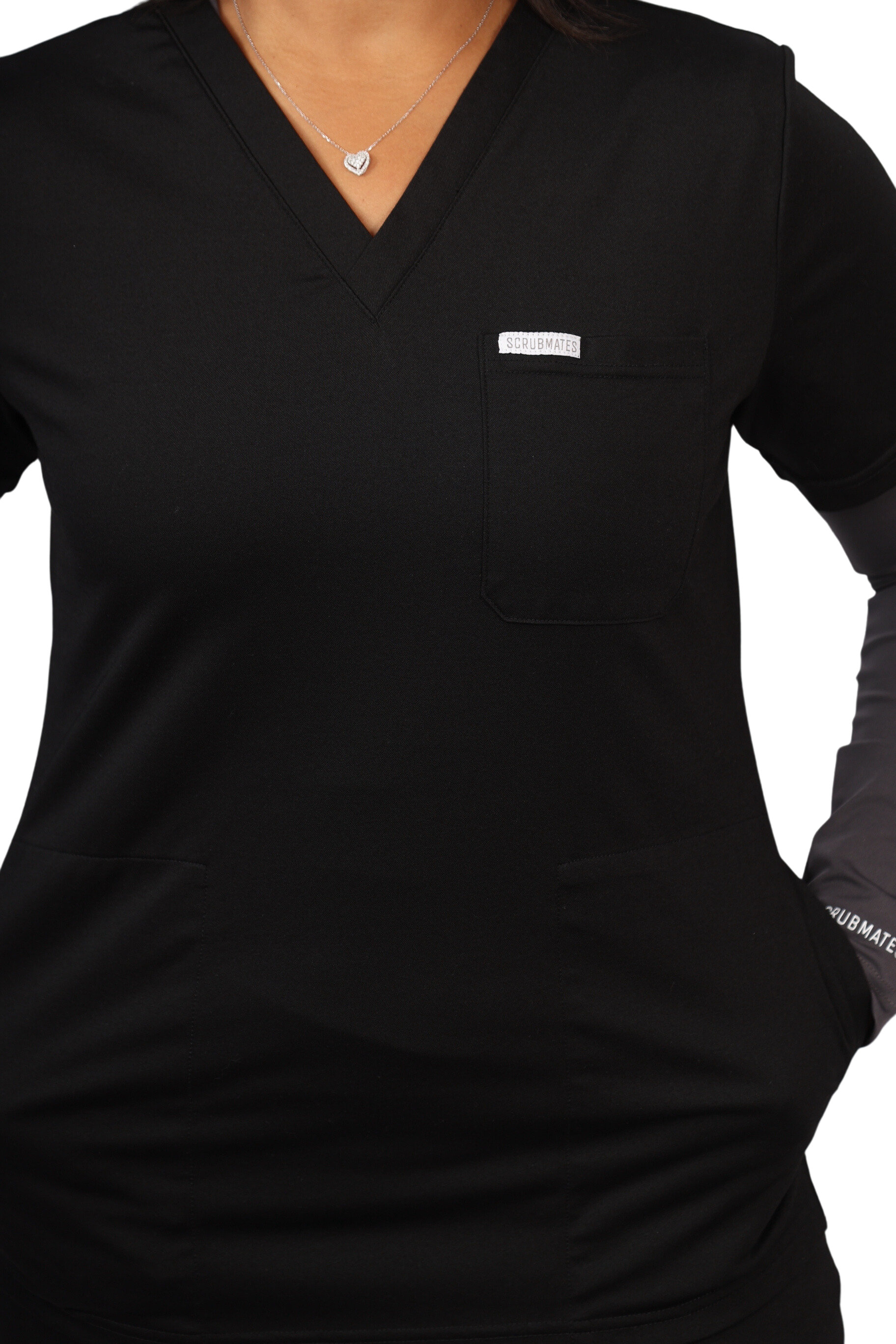 medical work uniform Scrubmates modern fit jogger black scrub pants for women made to pair perfectly with our modern fit jogger pants. Our exclusive design is on trend, professional and stylish. Made from a superior quality nylon/rayon/spandex fabric mix, this set offers unparalleled all-day comfort. Our luxe fabric blend offers the ultimate amount of stretch, and is designed to be flattering at every angle innovative design offers a chest pocket and 2 kangaroo pockets best scrub set for women figs scrubs