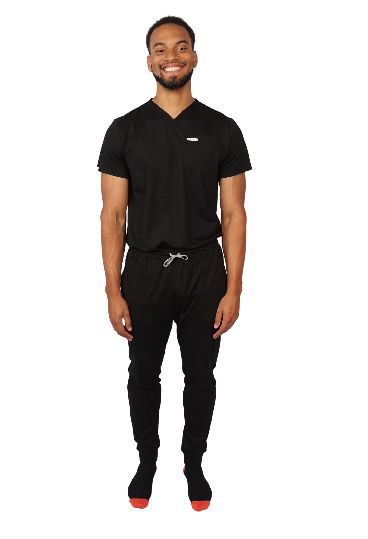 medical work uniform Scrubmates modern fit black scrub top for men made to pair perfectly with our modern fit jogger pants. Our exclusive design is on trend, professional and stylish. Made from a superior quality nylon/rayon/spandex fabric mix, this top offers unparalleled all-day comfort and the ultimate amount of stretch. Our thoughtful and innovative design offers 2 chest pockets and a pen pocket best scrubs for men figs scrubs