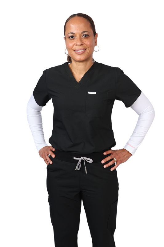 Elevate your work collection with the Scrubmates classic black scrub top for women made to pair perfectly with our classic straight leg pants.  Our exclusive design is trend-forward while still delivering timeless and professional style. Made from a superior quality polyester/rayon/spandex fabric mix, this top offers unparalleled all-day comfort. Our thoughtful and innovative design offers a chest pocket and 2 kangaroo pockets best scrubs for women figs scrubs